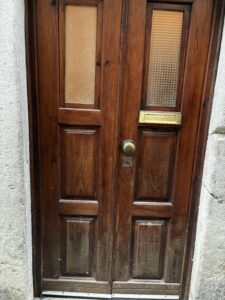 A brown door in Lisbon.
